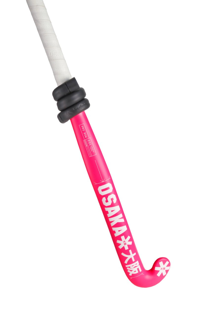 a pink and white hockey stick