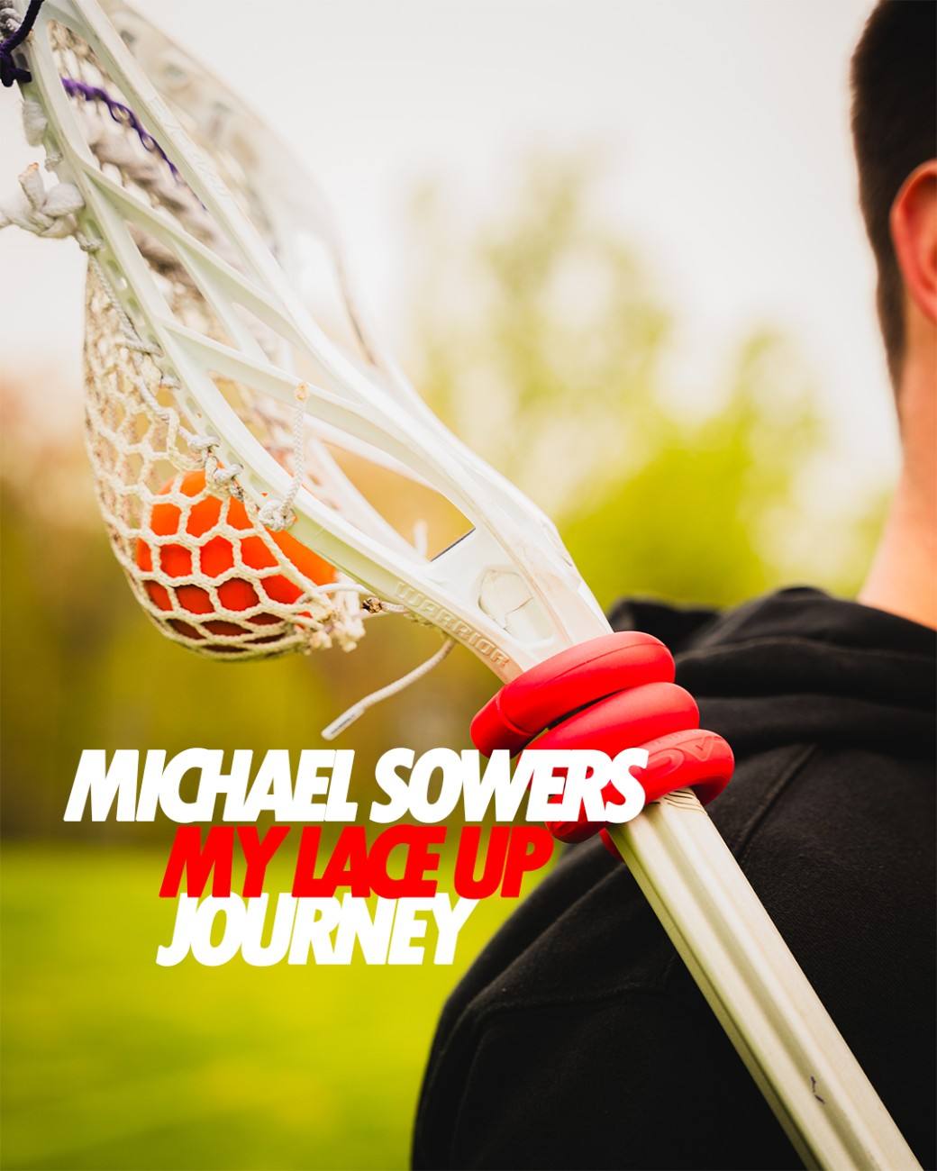 a person holding a lacrosse stick